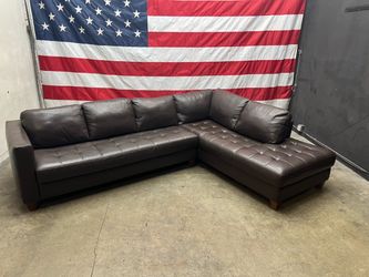 Delivery - Macys 2 Piece Leather Sectional Couch