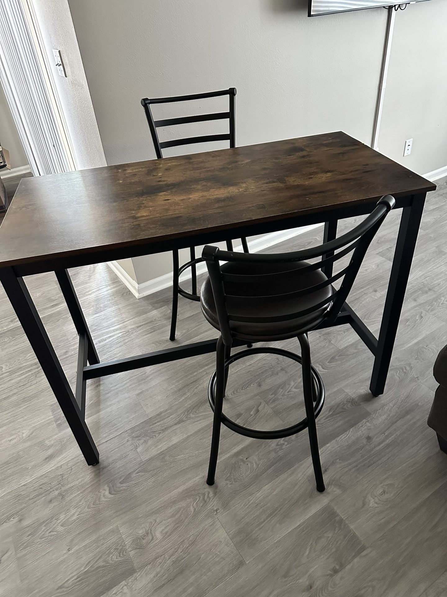 Table With Two Bar Stool Chairs