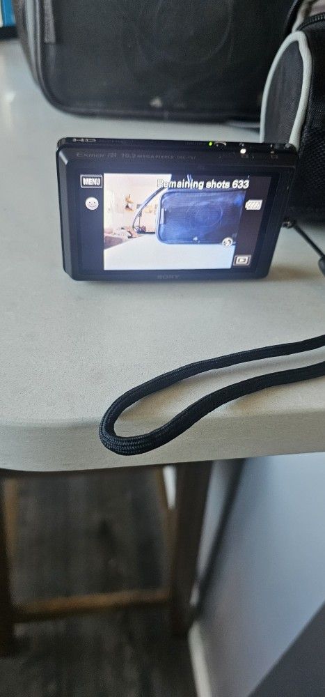 Sony Cyber-shot DSC-TX7 10.2 MP Digital Camera - Black With Bag