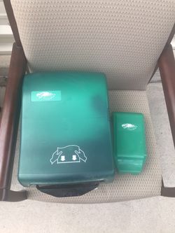 Paper towel and soap dispenser