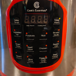 Cooks essentials pressure cooker never used.