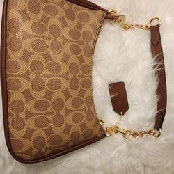 Coach shoulder bag in brown signature