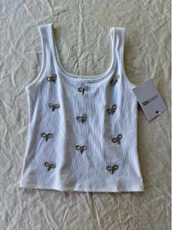 White shirt with bows