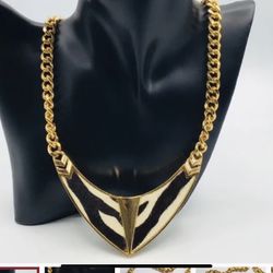 Black & White colors, Calf Fur inlay, Chunky Chain Statement piece, Beautiful Design, Approximate Flat Measurements: 16” Long, 20” with adjustable cha