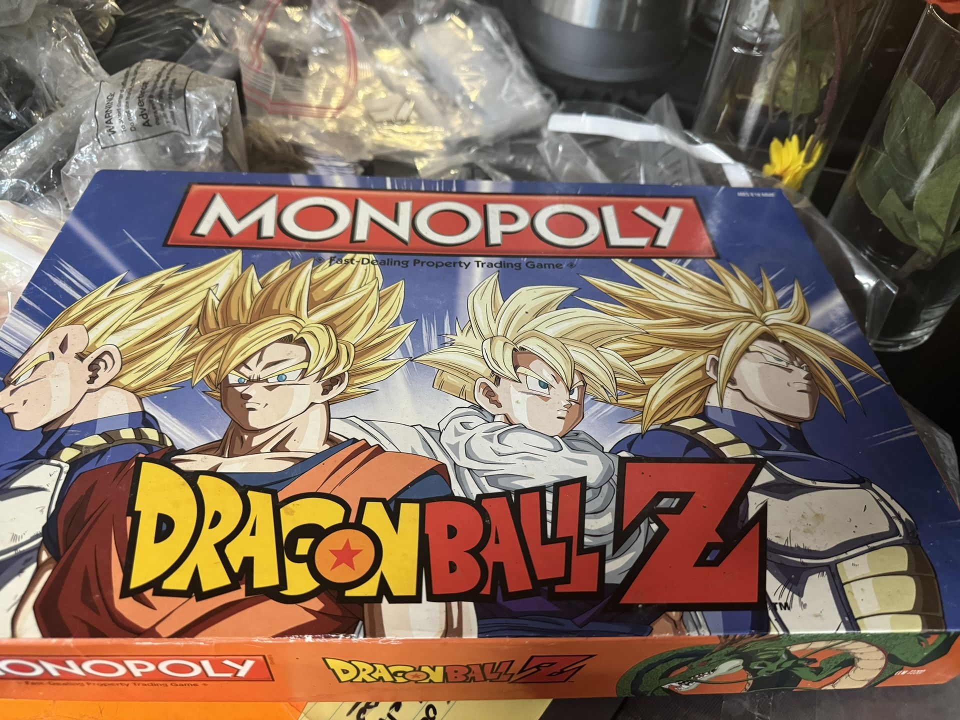 Dragon Ball Z Monopoly great shape we think the dog ate one piece that moves. instead of six moveable pieces there's only 5 