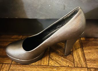 Brand new Madeline Silver 7.5 heels
