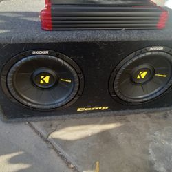 Two 12 In Kickers With A 1000 Wat Amp 