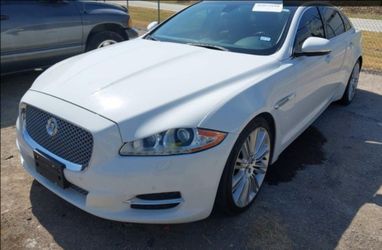 2013 jaguar xjl $8,500 cash full loaded, moonroof  leather, navigation tvs, v8 5.0 motor.