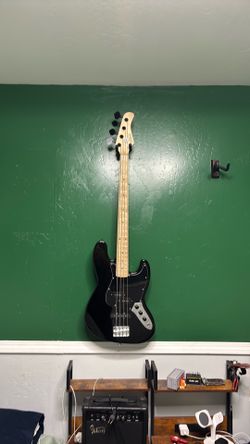 4 string bass guitar and amp