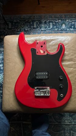Unknown electric  guitar body. Circa 1990s. Immaculate !! Bundle it with one of the amps. 50% off on the amp !!
