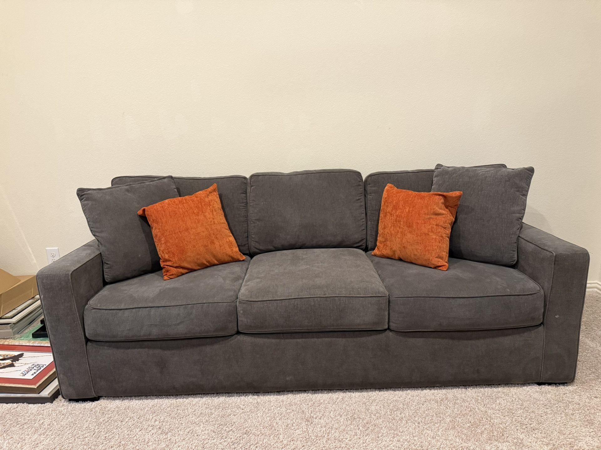 Modern Gray 3 Seater Sofa with Orange Accent Pillows