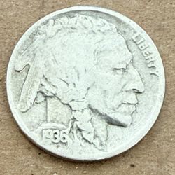 1936 Buffalo Nickel without a mint mark, struck as a business strike in the United States. It features an error variety. The coin bears the image of a