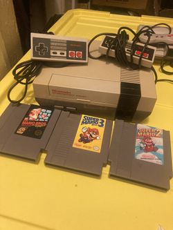 Nintendo NES With Mario Bros 123! Read Bio
