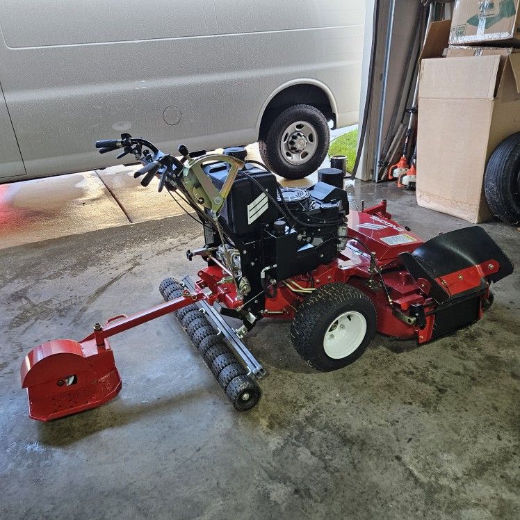 ENCORE 48" BELT DRIVEN WALK BEHIND MOWER 14.5 HP KAWASAKI ENGINE BARELY USED COMES WITH STRIPING KIT ONLY 10HRS USE ON MACHINE!!! SKU#: EW48FS481V