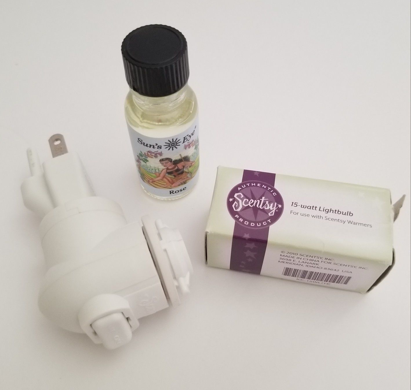New Scentsy Ceramic Warmer Plug, Bulb & Rose Oil