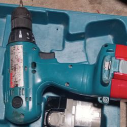 Makita Drill . Model # 6233D. Includes Battery, Battery Charger, Case and Instruction Manual.