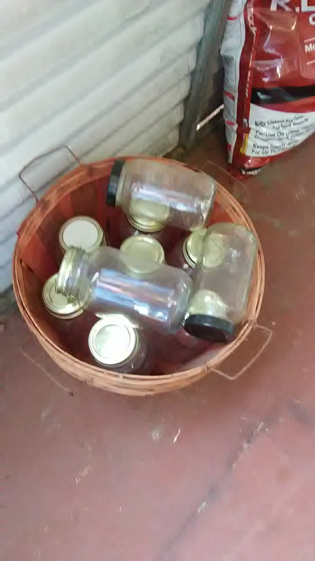 2 baskets with canning jars