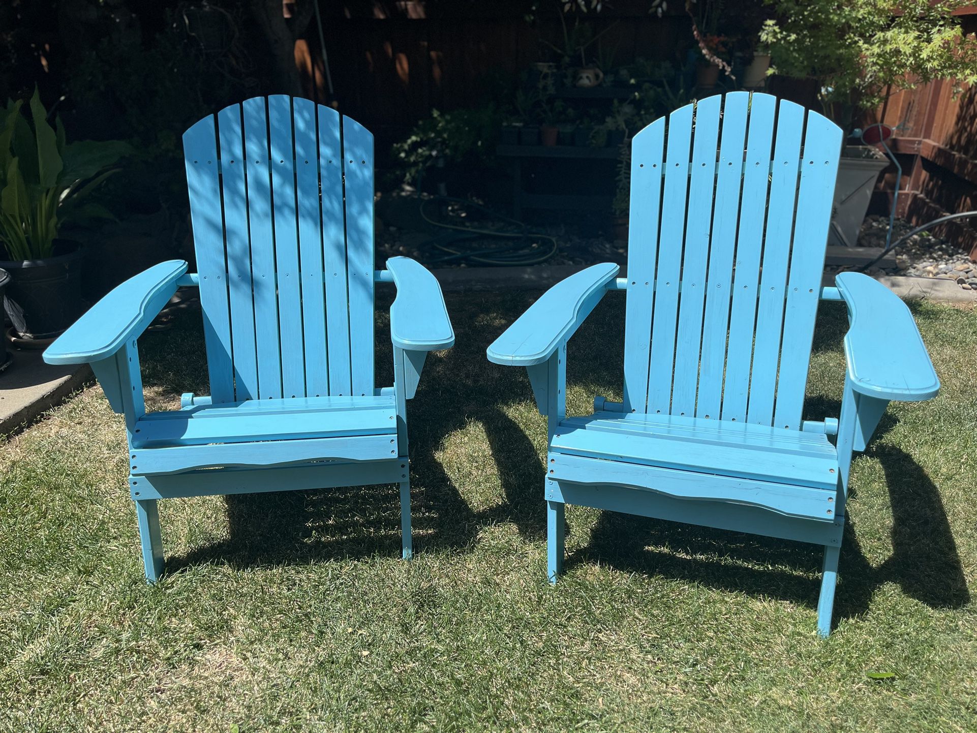 2 Adirondack chairs