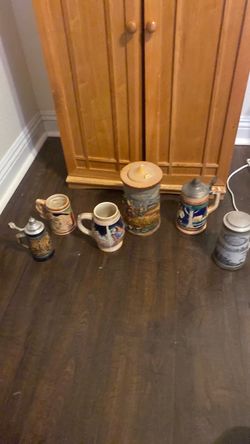 Set of 5 Collectible German Beer Steins and candle