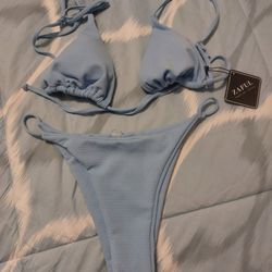 New Beautiful Bathing Suit Size M.  Light BLUE.  CASH PICKUP ONLY 