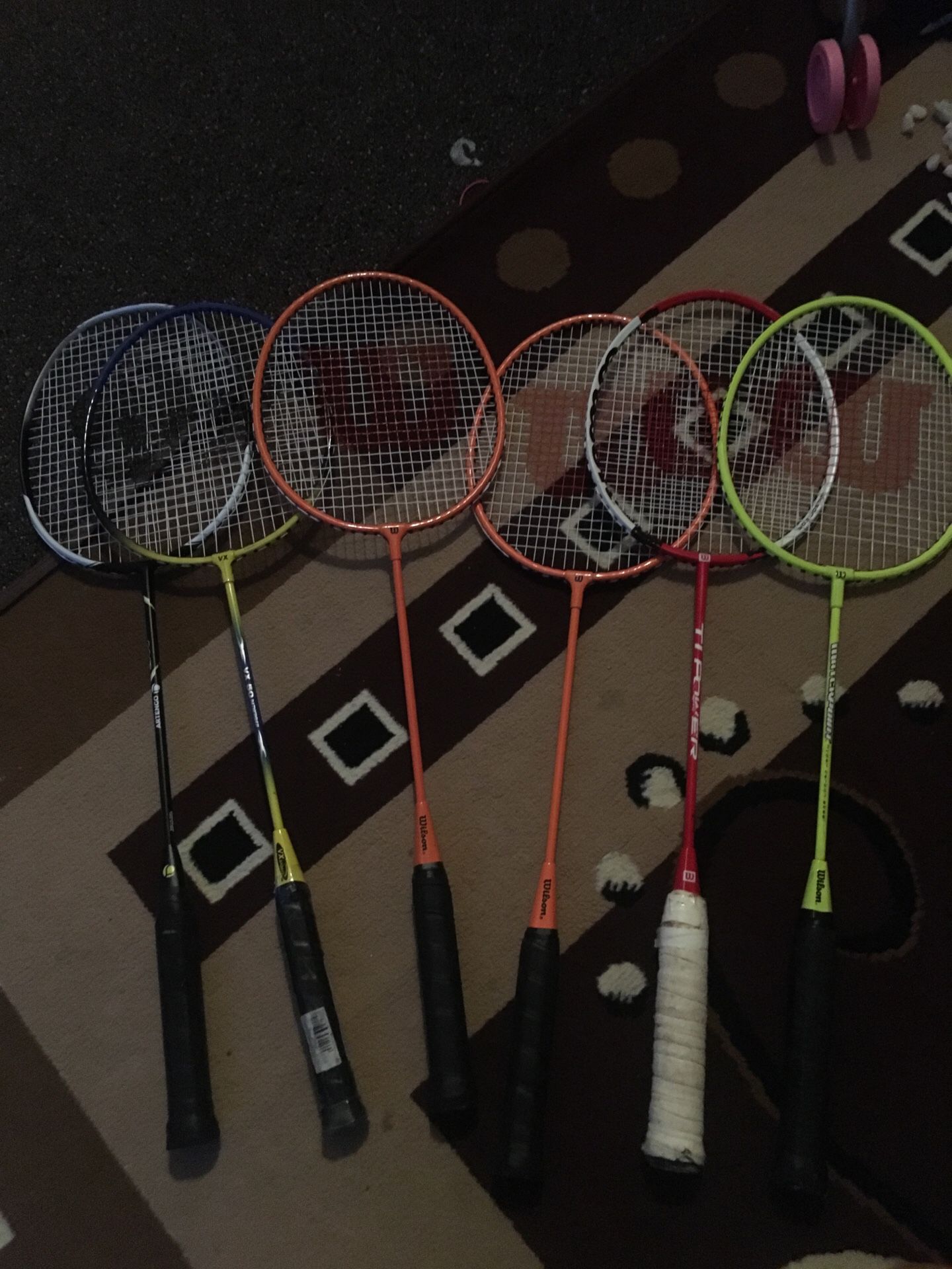 6 badminton rackets.. 4 Wilson and 2 others
