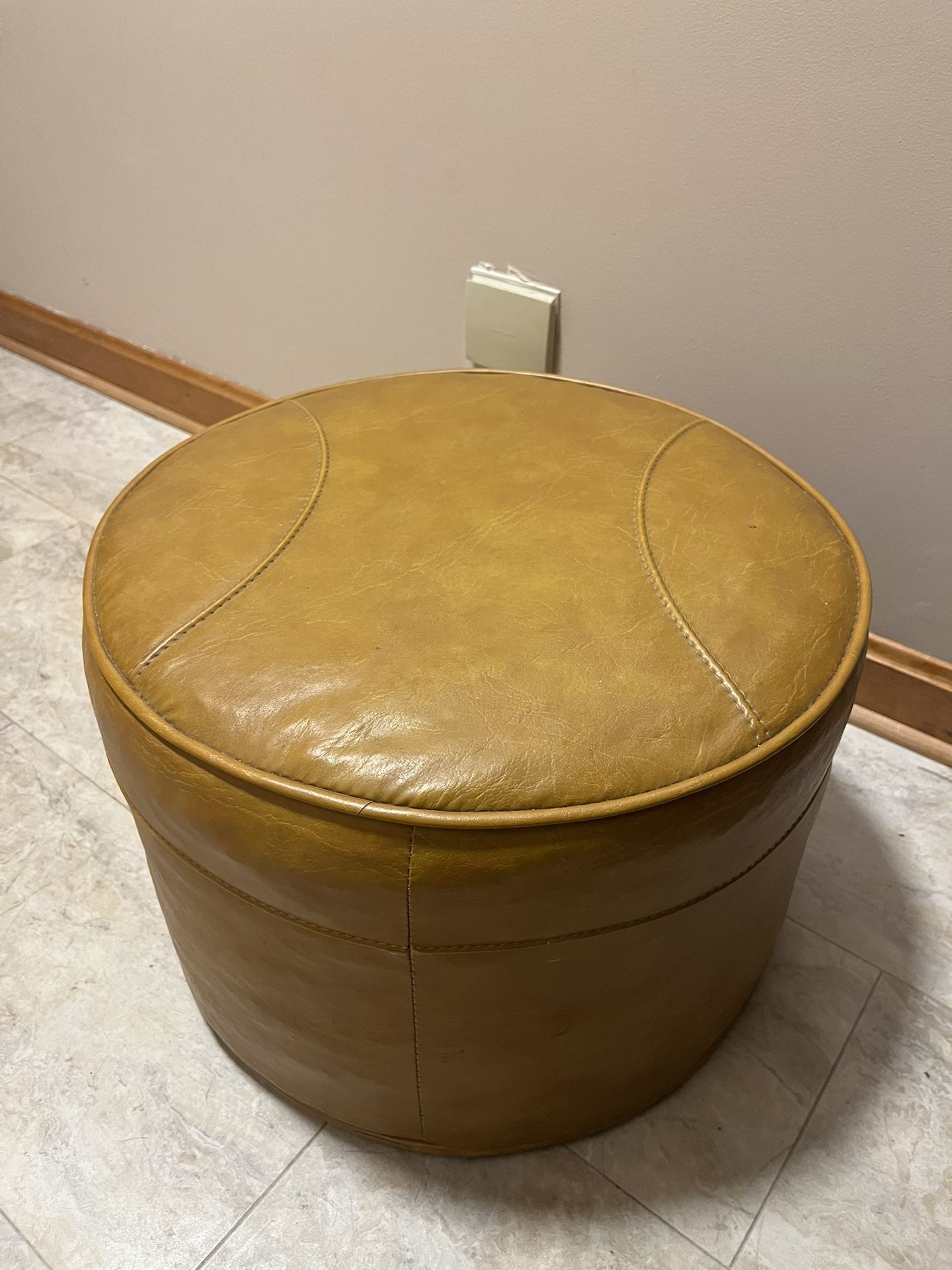 Vintage round tan ottoman