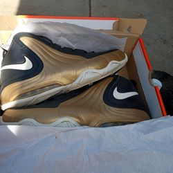 men's Nike Air Max Wavy sneakers in the Black/Metallic Gold-White colorway.