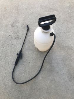 All purpose refillable spray bottle