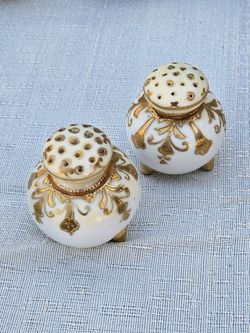 Gold antique shakers.