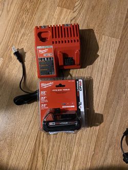 Milwaukee a battery and a charger $110