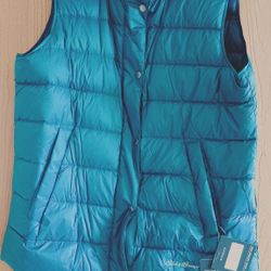 New Ladies Eddie Bauer Down Vest with tags size large. See our other great art antiques jewelry Sports outdoors fishing furniture VHS movies Collectib