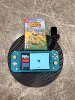 Nintendo switch lite teal with animal crossing game
