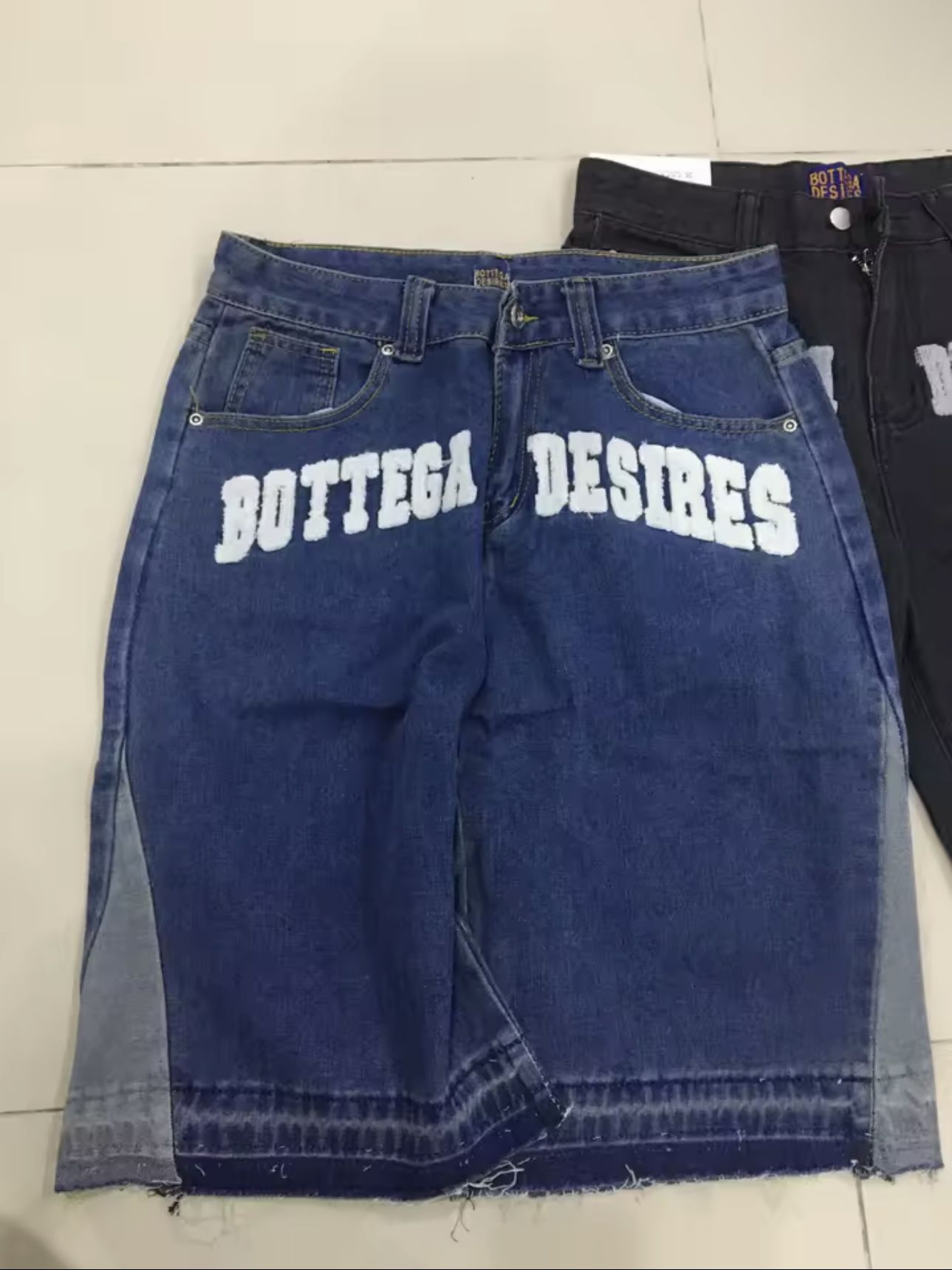 Get that iconic streetwear edge. Our vintage-inspired, high-waist denim shorts boast head-turning distressed details and cool letter decoration. The u