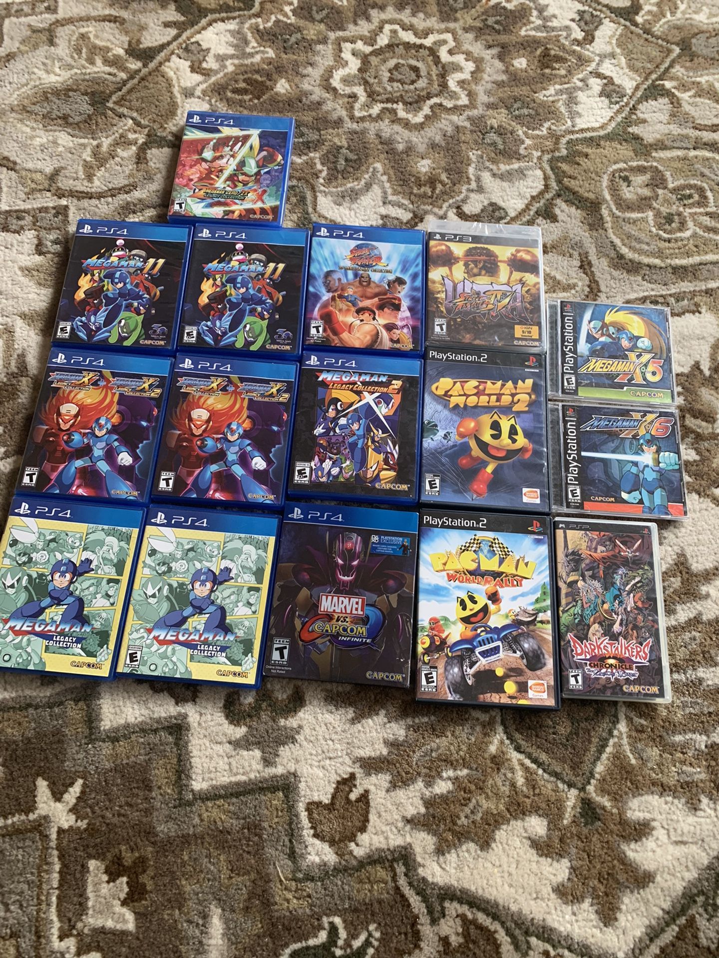 Sealed street fighter 4 ps3 brand new 85$ Megaman x6 ps1 45$ megaman x5 ps1 45$ Darkstalkers chaos tower ps1 35$ Rest are 20 dollars or less Pac-Man w