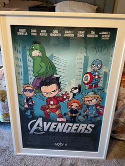 Framed avengers poster singed by Skottie young