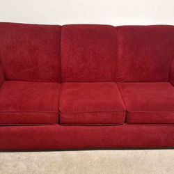 Comfy and Cozy Red Couch w Pull Out Bed