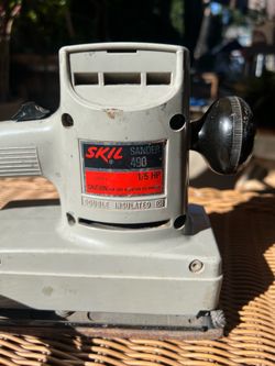 Oil school skil sander, works. Gets the job done.
