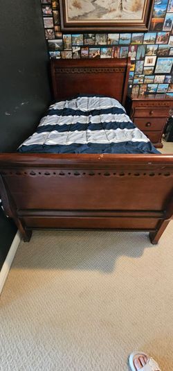 Wood twin bed frame and 1 nightstand