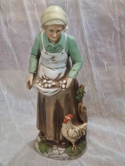 Porcelain Farmwoman with Chicken Figurine