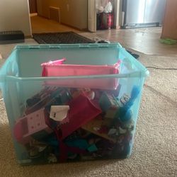 Big bin of barbie playsets and dolls
