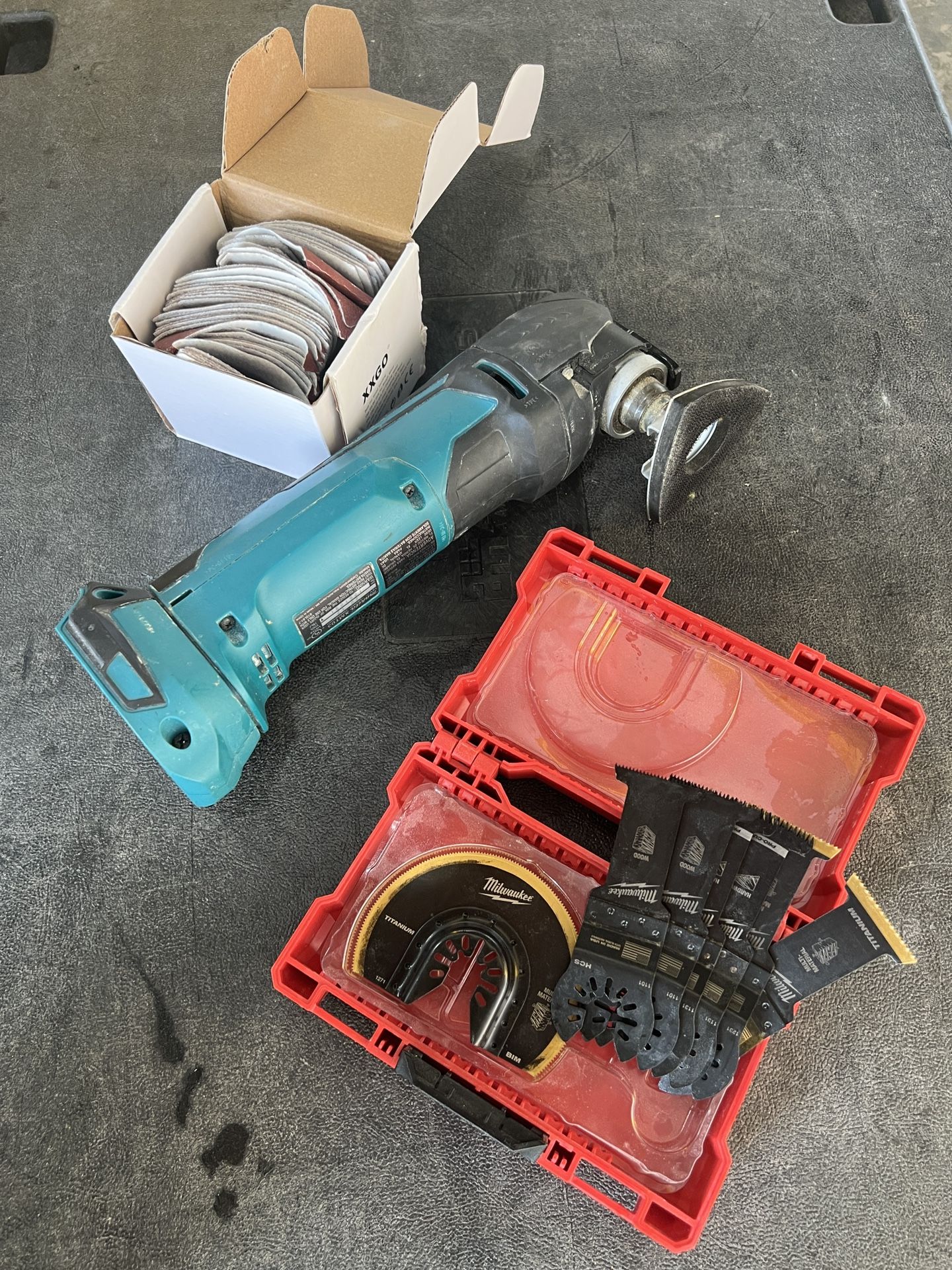 Makita XMT03 Oscillating Multi-Tool W/ Blade Kit + Sanding Kit - Excellent Condition