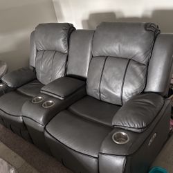 Two Leather Gray Recliner Couches Cup Holders 