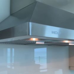 WOLF DOUBLE OVEN 30” HOOD 36” GAS COOKTOP 36” WARMER DRAWER 30” MICROWAVE 24” SUBZERO WINE COOLER 24” ASKO DISHWASHER 24”