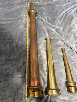 Vintage brass fire hose nozzles