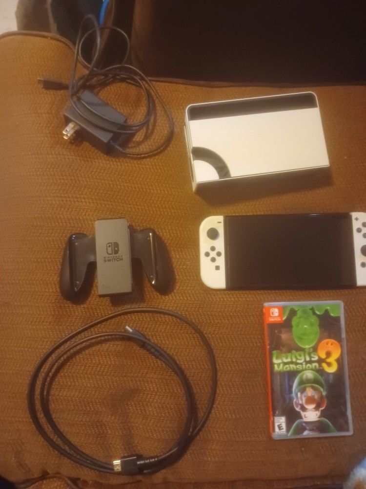 Nintendo Switch OLED (White) – Full Bundle (Console, Joy-Cons, Dock, Charger, HDMI Cable + Luigi’s Mansion 3)