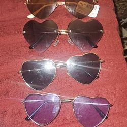 HEART SHAPED SUNGLASSES. $9EACH FIRM