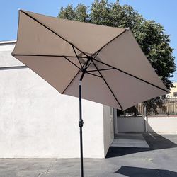 $35 (Brand New) Outdoor 10ft patio umbrella with tilt and crank, garden market (base not included) 