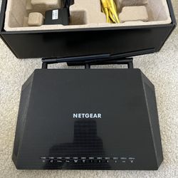 NETGEAR Nighthawk Smart Wi-Fi Router (R6700) + NETGEAR Cable Modem (CM500)