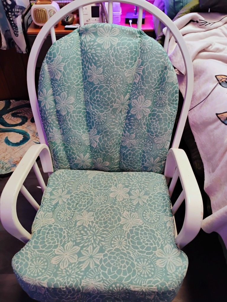 White Rocker And Floral Cushion
