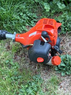 Echo SRM-2620T string trimmer. Orange